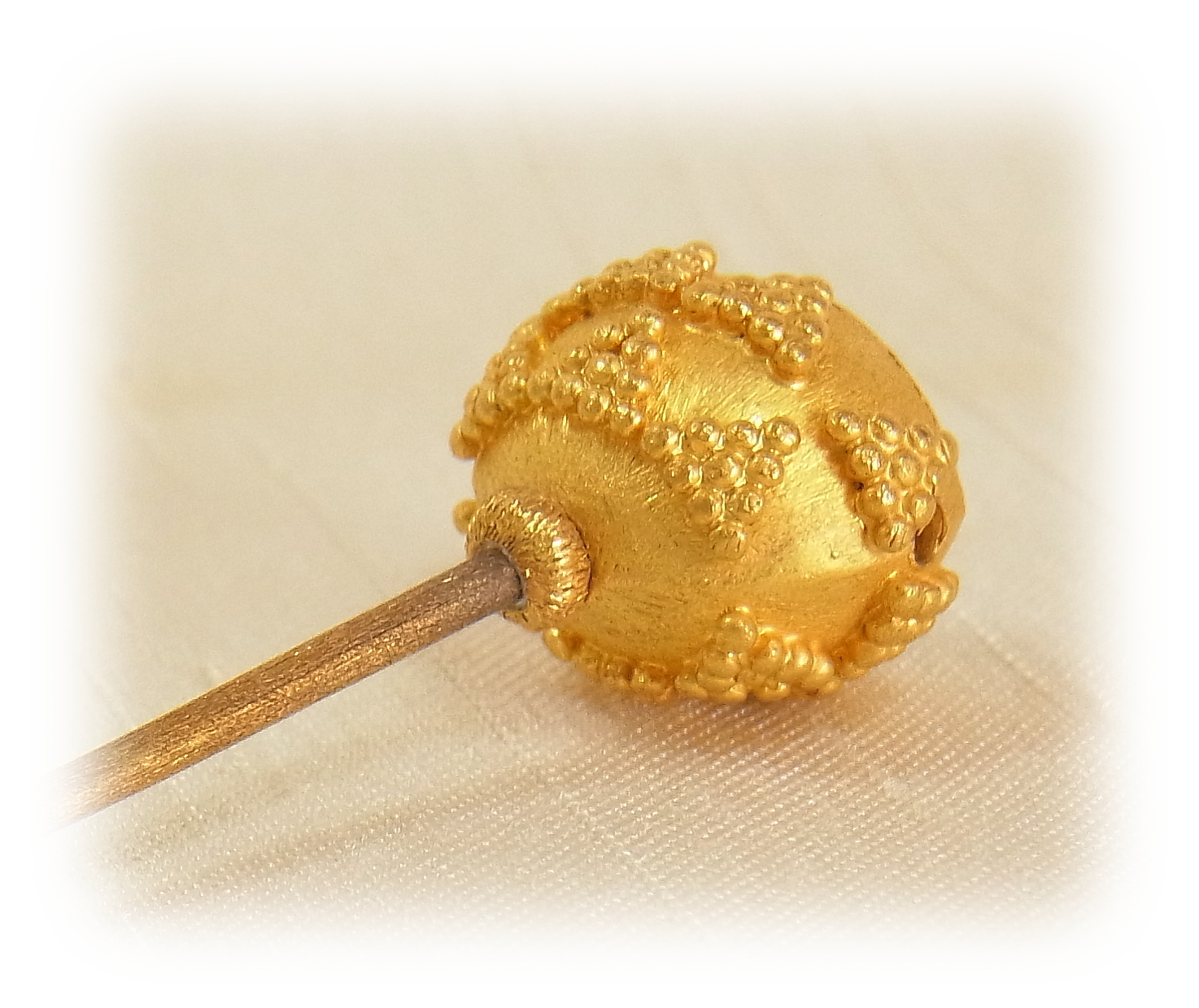 Gold granulation Pin with ruby (photo taken from below)