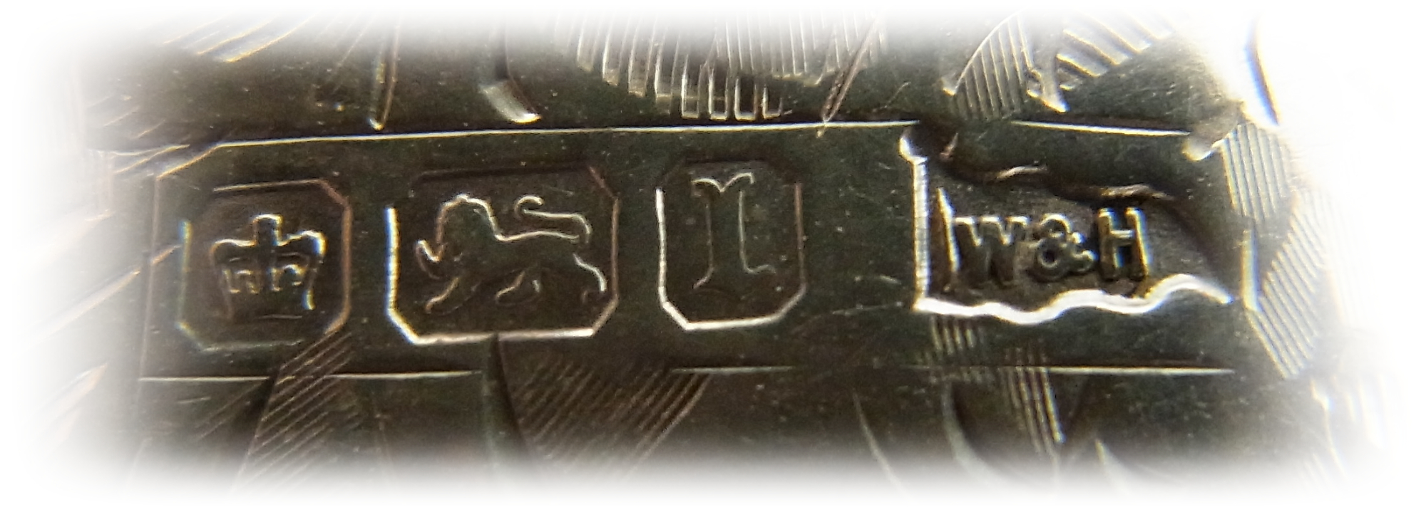 Sheffield  hallamrk on the silver coin-holder